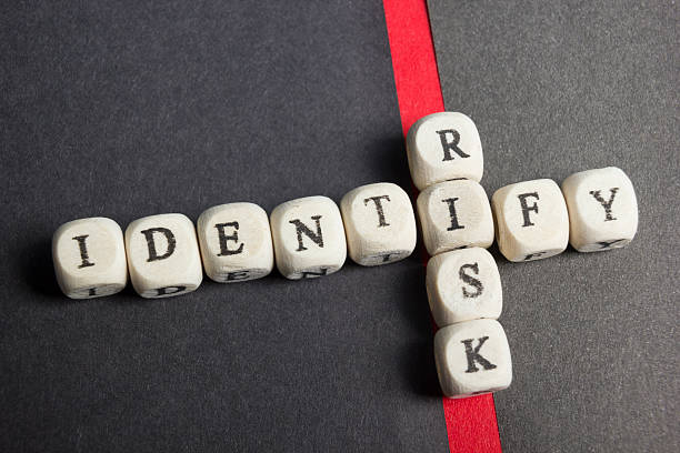 Risk indentify crossword blocks on table. Top view.